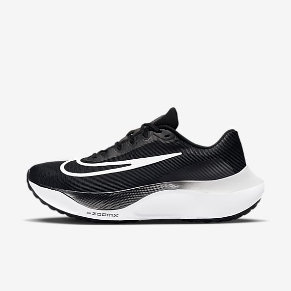 Nike running shoes black and white soles discount